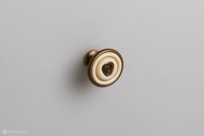 Marta мебельная ручка-кнопка брашированная старинная бронза с кремовой керамической вставкой